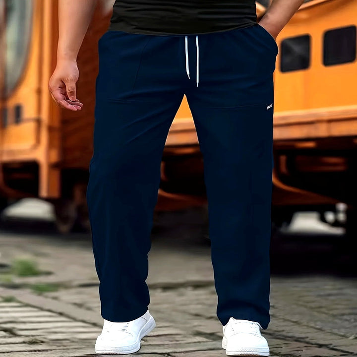 Comfortabele zwarte heren casual broek met elastische tailleband en katoenmix stof, perfect voor dagelijks gemak.