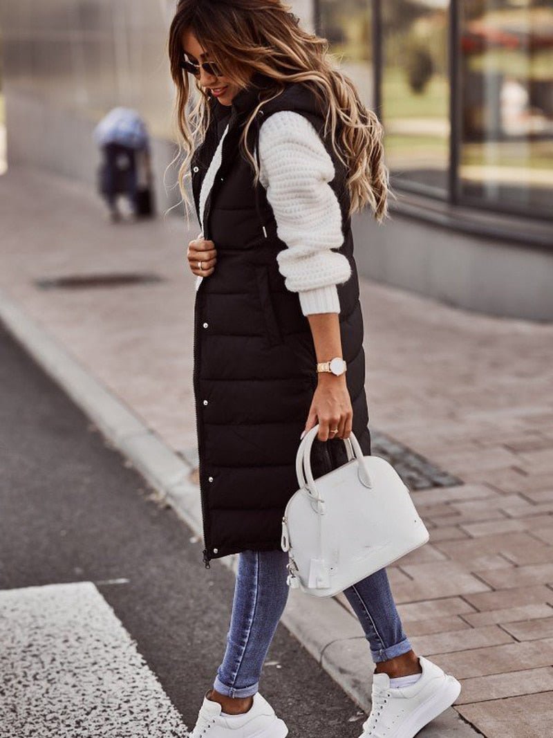 Nieuwe collectie warme, lange gewatteerde dames bodywarmer. Comfortabel vest voor wintermode en laagjes.