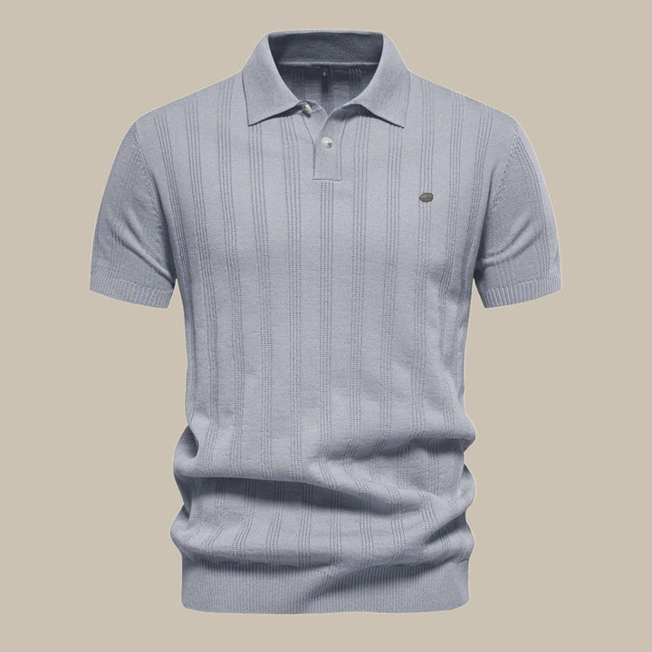 Elegante heren gebreide polo met korte mouwen. Een chique en comfortabele top voor dagelijkse zomerkleding.