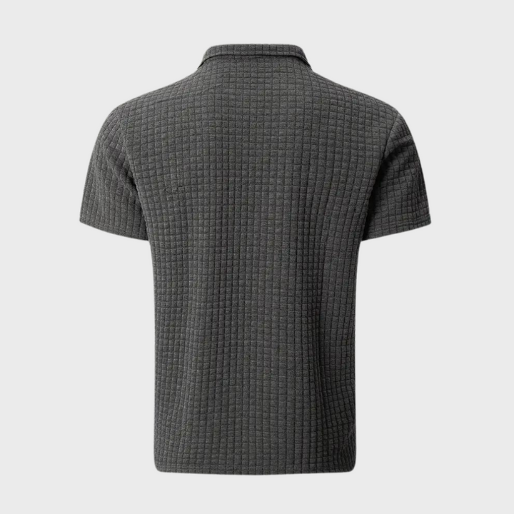 Blauw heren poloshirt, veelzijdig en modieus, geschikt voor een casual look.