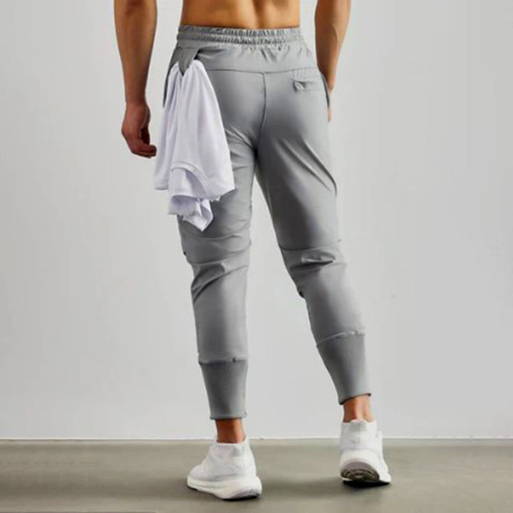 Grijze heren joggers, lichtgewicht stretchstof, ideaal voor fitness en ontspanning.