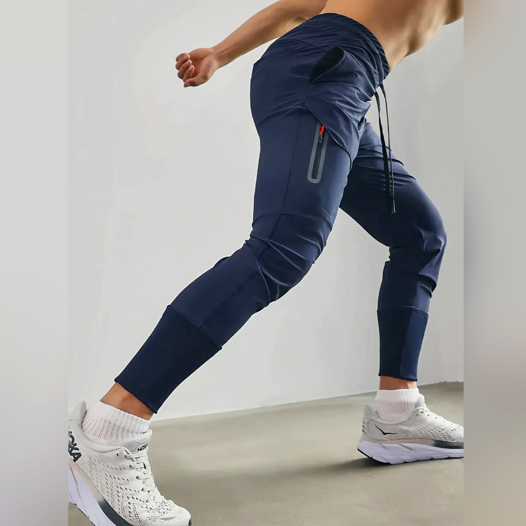 Flexibele heren joggers, lichtgewicht stretchstof voor onbeperkte beweging tijdens sport.