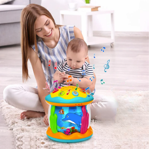 Cadeau-idee: Zintuiglijk speelgoed trommel met lichtspel en muziek voor urenlang speelplezier en ontwikkeling baby's.