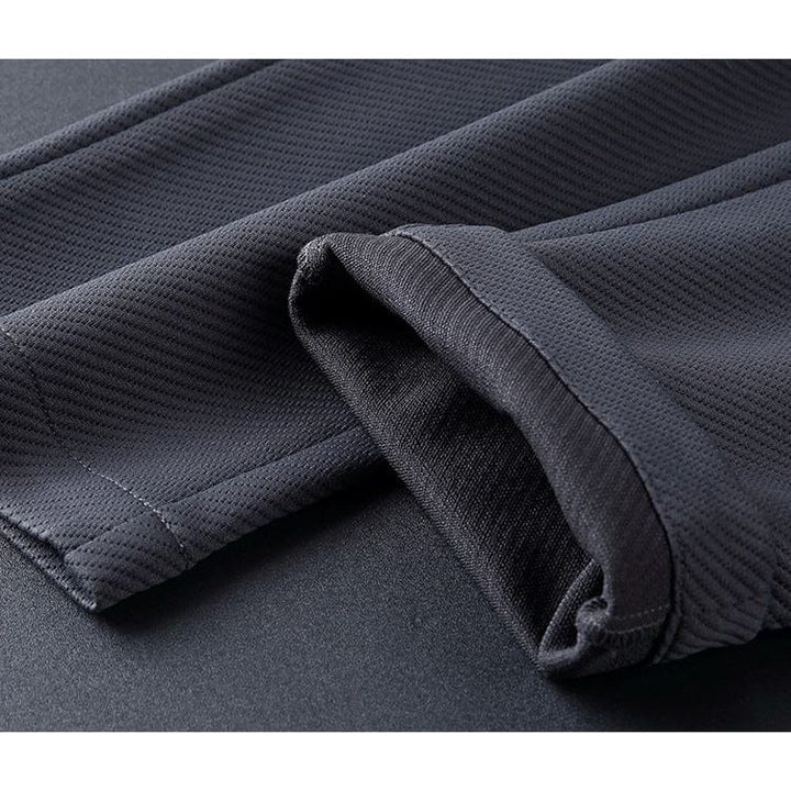 Modern zwart/blauw Lucas heren trainingspak, perfect voor sportkleding, biedt ultiem comfort en stijl.