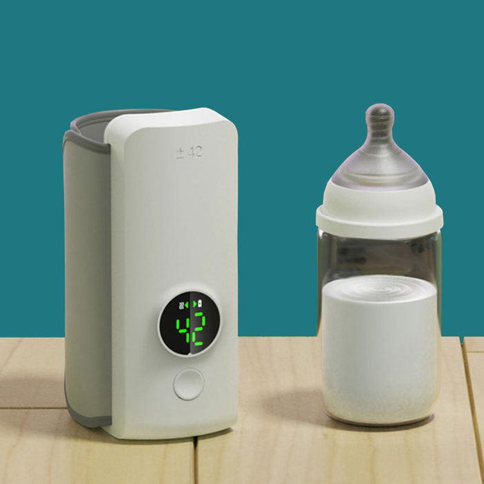 Moderne draagbare flessenwarmer, oplaadbaar en snel. Ideaal voor het verwarmen van babyvoeding, thuis of onderweg.
