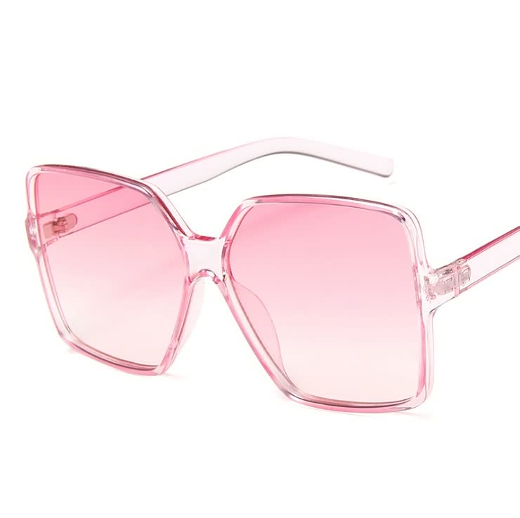 Modebewuste dames zonnebril InStyle™: een trendy oversized accessoire met gekleurde glazen voor elke outfit.