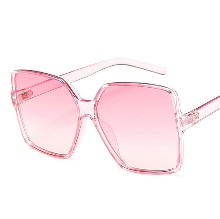 Modebewuste dames zonnebril InStyle™: een trendy oversized accessoire met gekleurde glazen voor elke outfit.