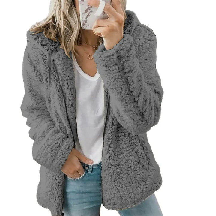 Zachte FluffyCoat™ damesjas met capuchon, ideaal voor koude dagen. Warm, comfortabel en modieus.