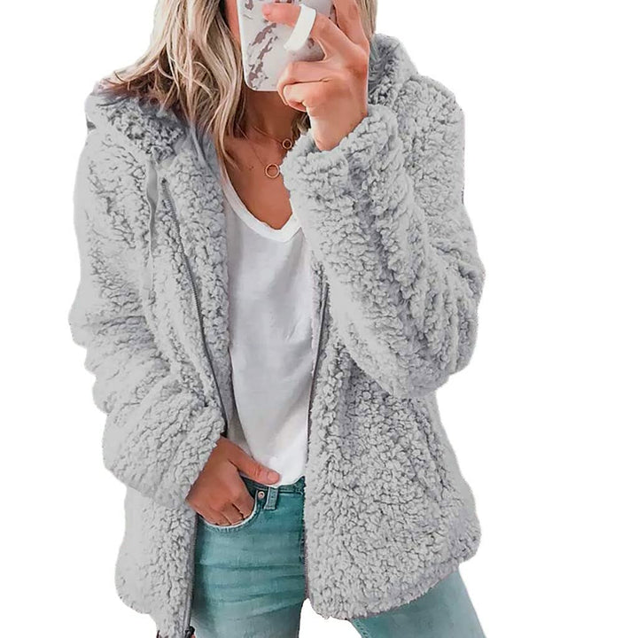 Dames FluffyCoat™ winterjas met capuchon, warm en stijlvol. Perfect voor dagelijks comfort en mode.