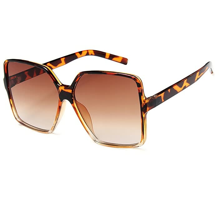 Stijlvolle InStyle™ dames zonnebril met grote, trendy glazen en modern montuur, perfect voor modebewuste vrouwen.