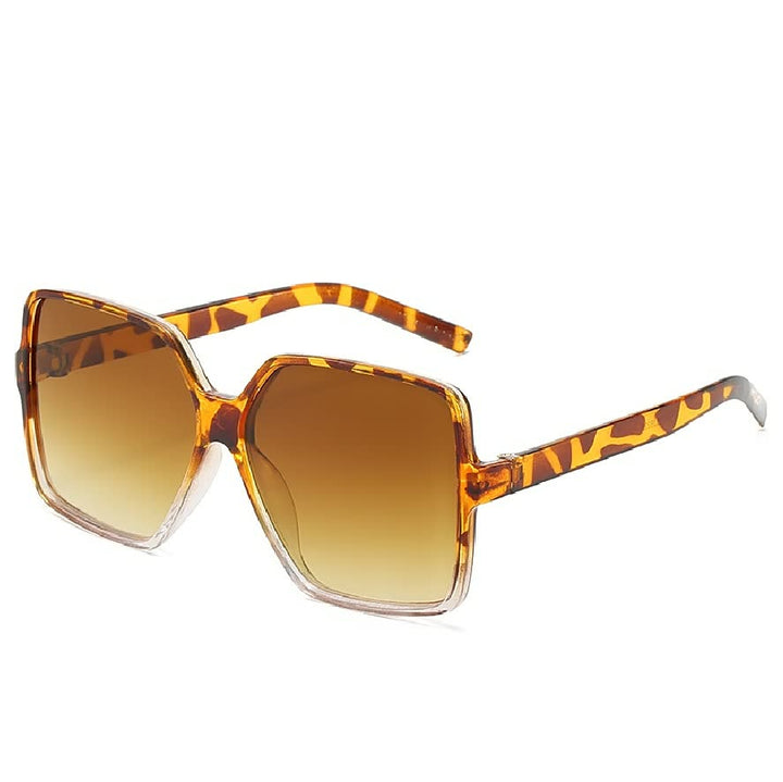 Zij-aanzicht van InStyle™ dames zonnebril, toont elegant oversized montuur en trendy gekleurde glazen.