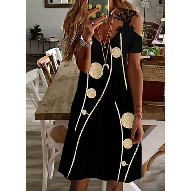 Zomerse damesjurk met bloemenprint, ideaal voor een relaxte maar elegante zomerstijl.