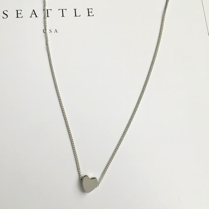 ExquisiteChain™ damesketting met glanzend hartje. Elegantie en stijl voor vrouwen.