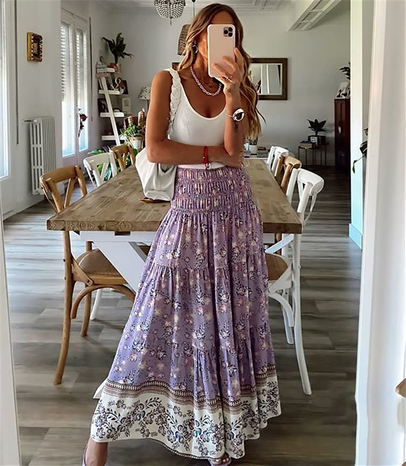 Zomerse bohemian dames maxirok met levendige bloemenprint, comfortabel en elegant.