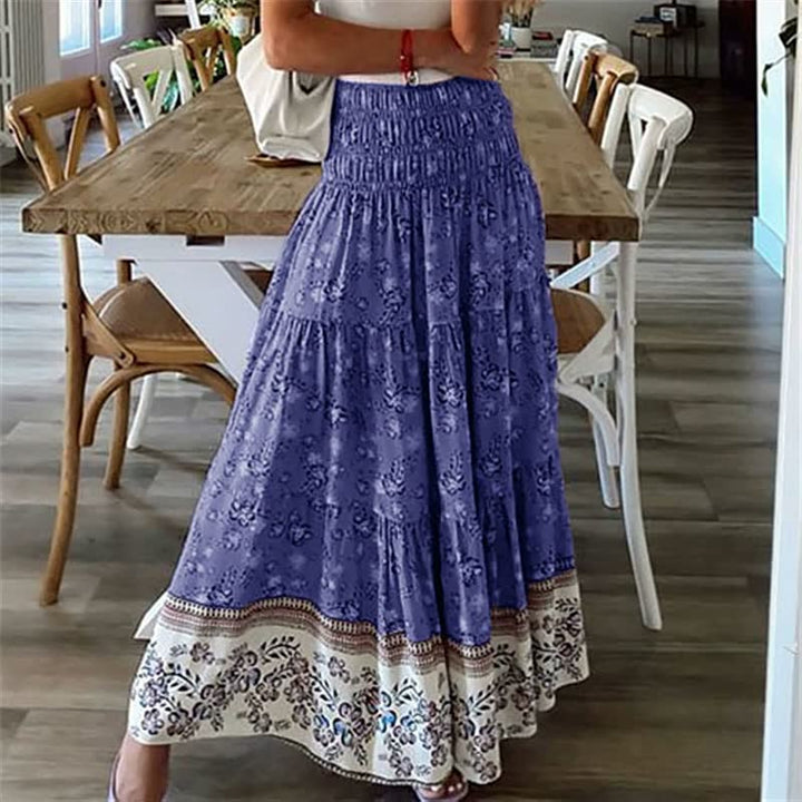 Bloemenprint lange dames maxirok, comfortabel en trendy voor zomerse dagen.