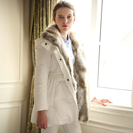 Comfortabele lange winterjas voor dames, met warme capuchon.