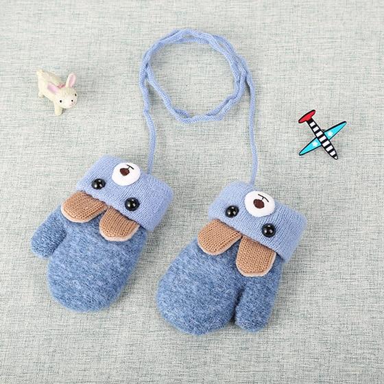 Warme wantjes voor kinderen met vrolijke konijnenoren en koord. Perfect voor koude dagen.