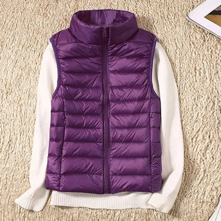 Modieuze casual dames bodywarmer met rits, ideaal als tussenjas voor comfortabele winterkleding.