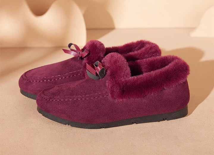 Zachte grijze dames pantoffels, met warme voering, voor gezellige avonden thuis.