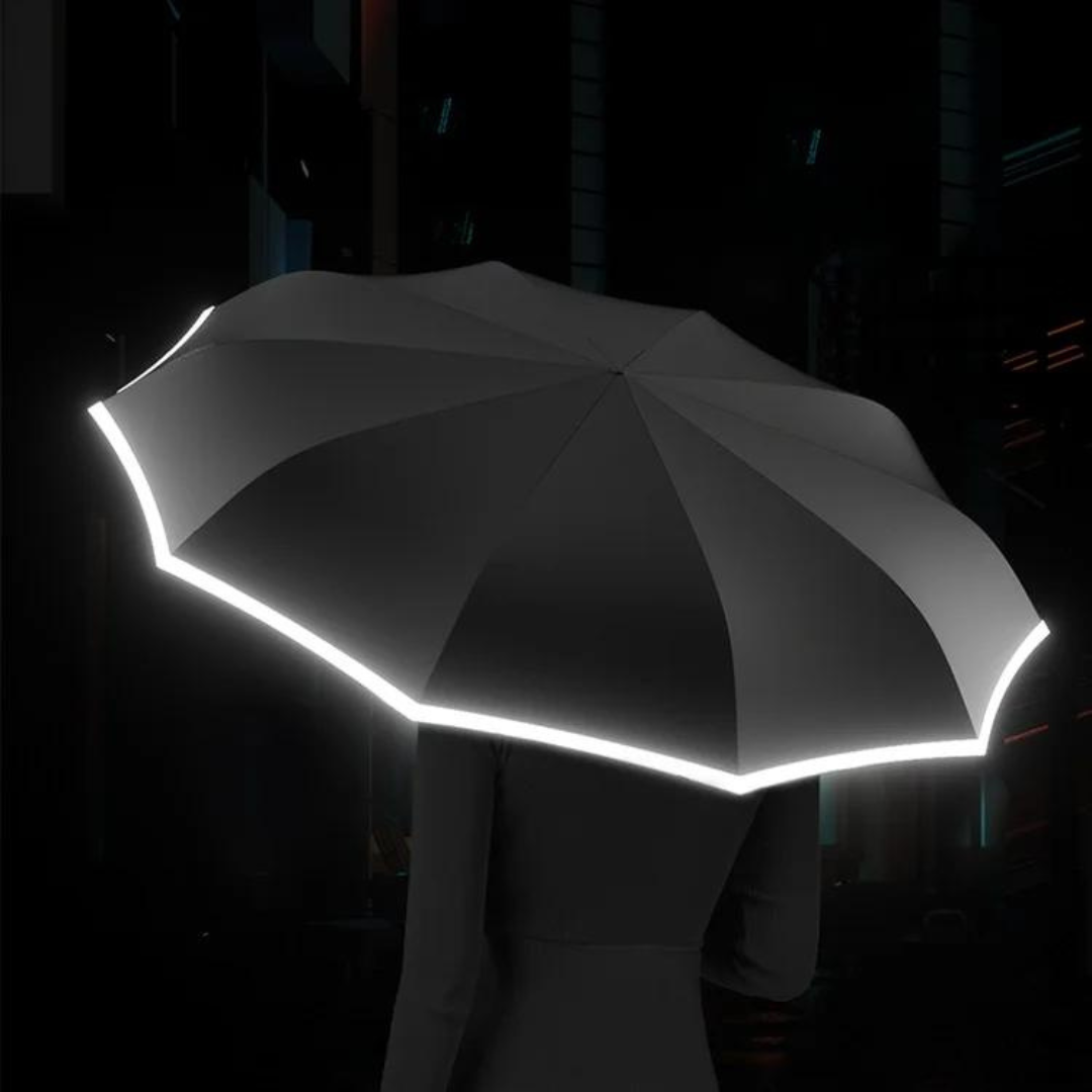 Opgevouwen compacte paraplu met reflectie, perfect voor onderweg en makkelijk mee te nemen.