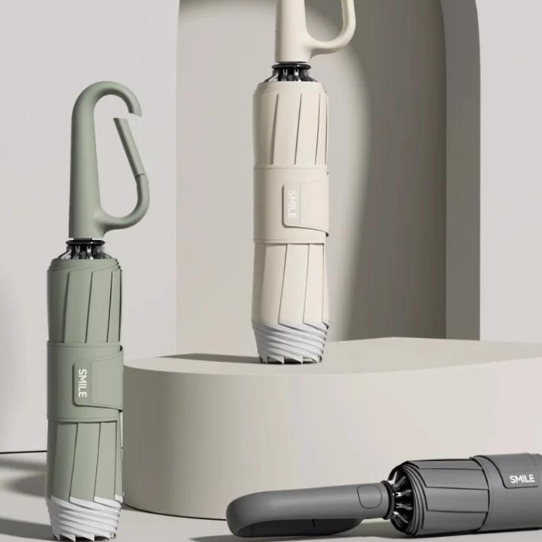 Ergonomisch handvat van de reflecterende, windbestendige paraplu; comfort en grip tijdens regen.