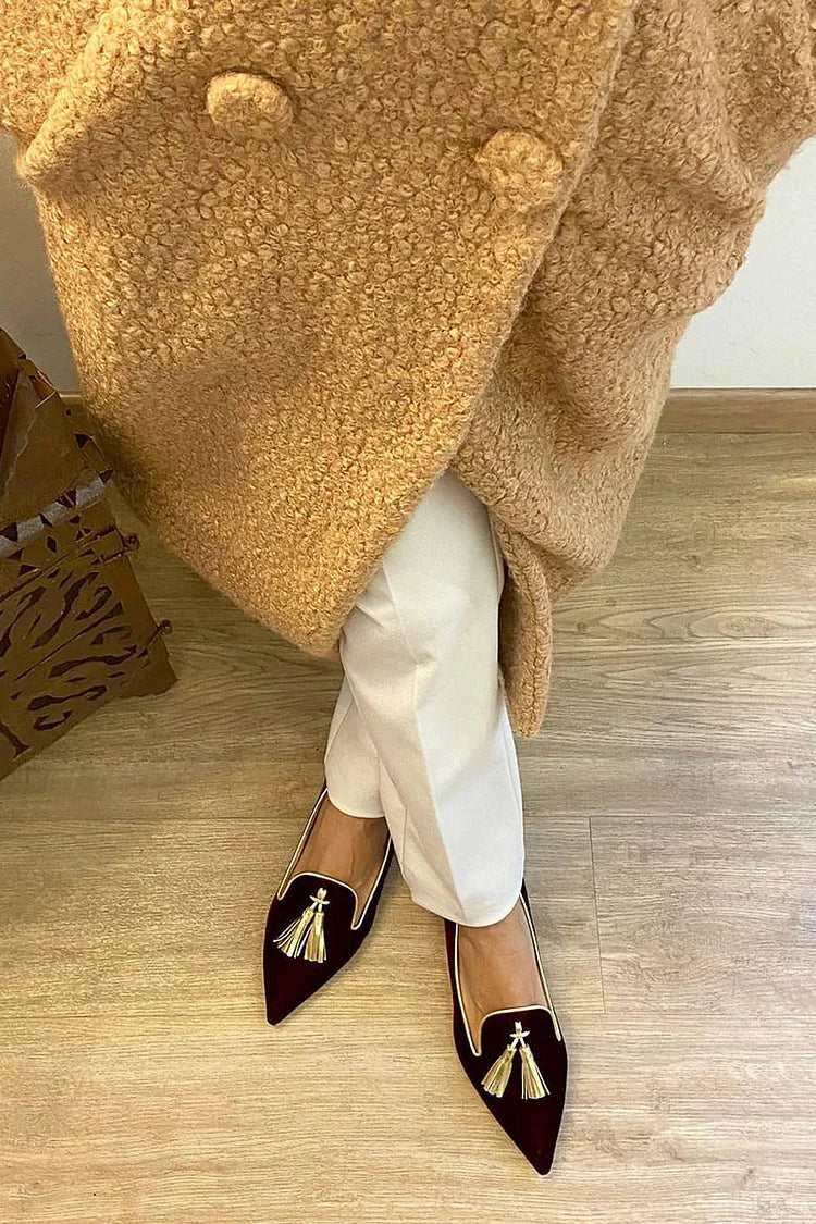 Elegante paarse dames instappers met kwastjes, ontworpen voor orthopedisch comfort en voetondersteuning.