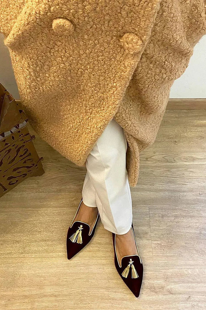 Elegante paarse dames instappers met kwastjes, ontworpen voor orthopedisch comfort en voetondersteuning.