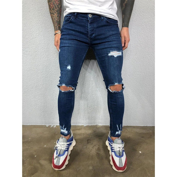 Casual heren gescheurde skinny jeans, geschikt voor zowel zomer als winter, met een moderne pasvorm.