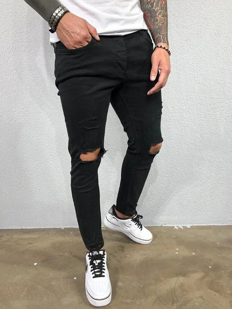 Comfortabele heren skinny jeans met strategische scheuren, voor een stijlvolle en trendy uitstraling.