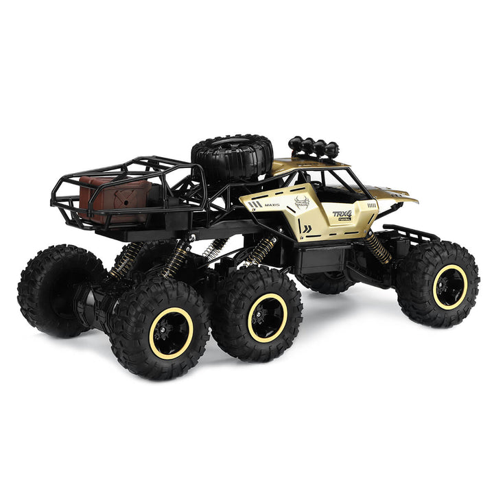 Afstandsbestuurbare 6-wiel RC monstertruck scheurt door off-road terrein. Krachtige modelauto voor actievol speelplezier.