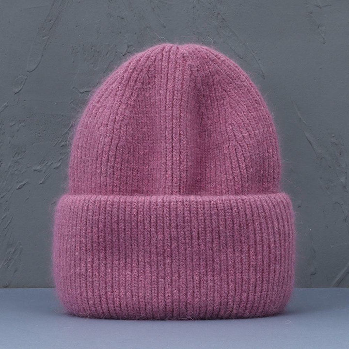 Dames muts van zacht konijnenbont. Warme en stijlvolle wintermuts voor dames.