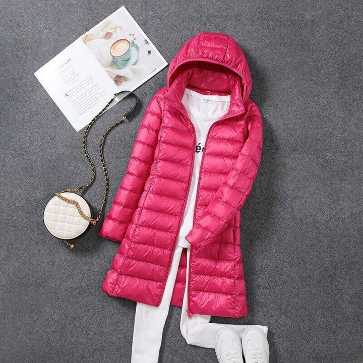 Khaki Dames Lange Winterjas Daisy, gewatteerd, warm en veelzijdig voor elke winterse outfit.