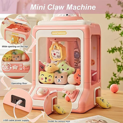 "Roze Mini Claw Machine speelgoed met licht- en geluidseffecten voor kinderen, ontwikkelt fijne motorische vaardigheden."