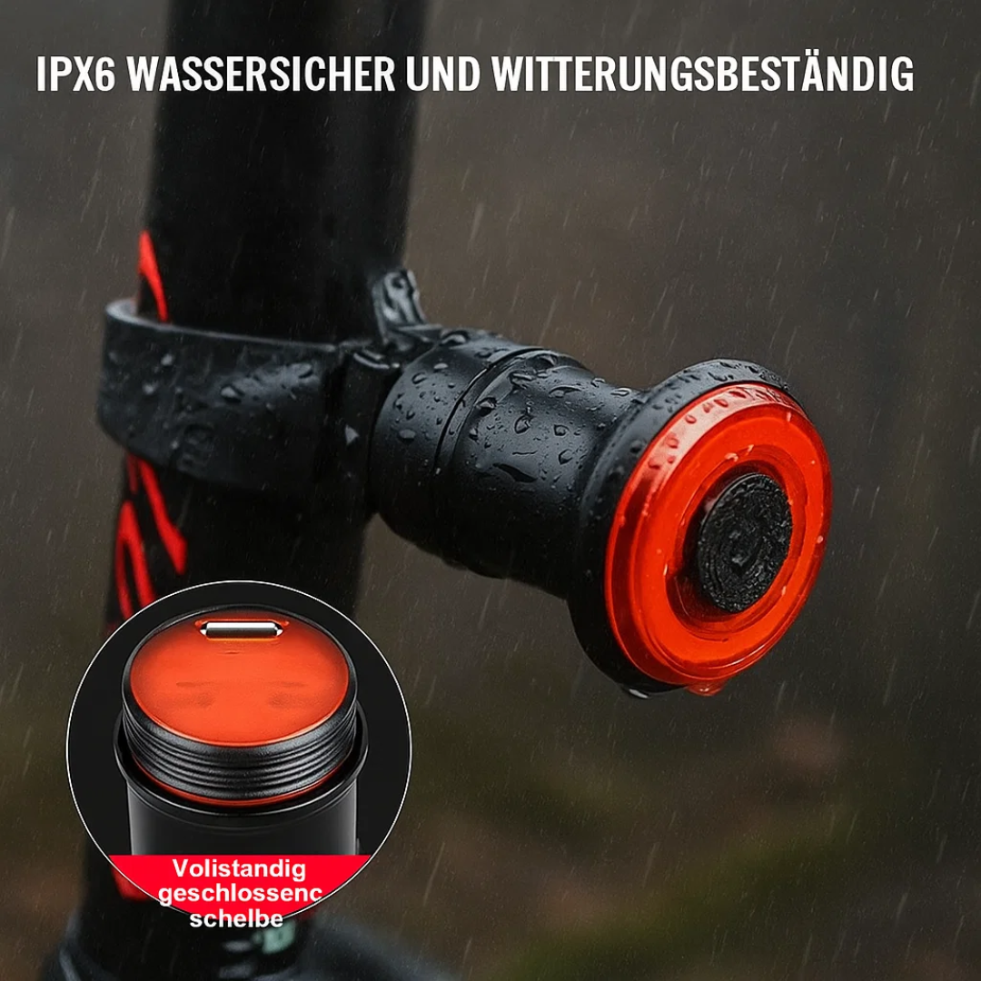 Racefiets achterlicht met heldere LED's en remlicht, verhoogt veiligheid tijdens snelle ritten.