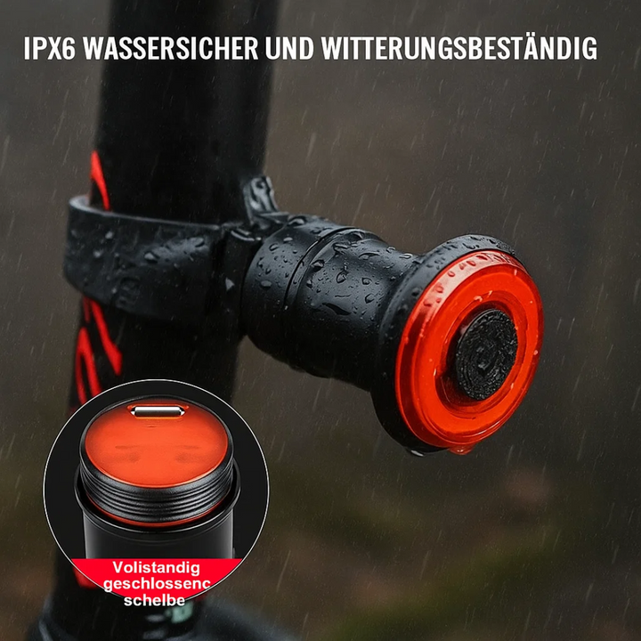 Racefiets achterlicht met heldere LED's en remlicht, verhoogt veiligheid tijdens snelle ritten.