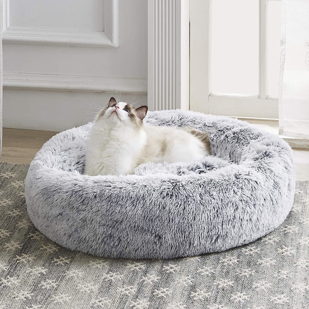 Huisdierenbed voor ontspanning en slaap; zacht pluchen donutbed voor honden en katten.