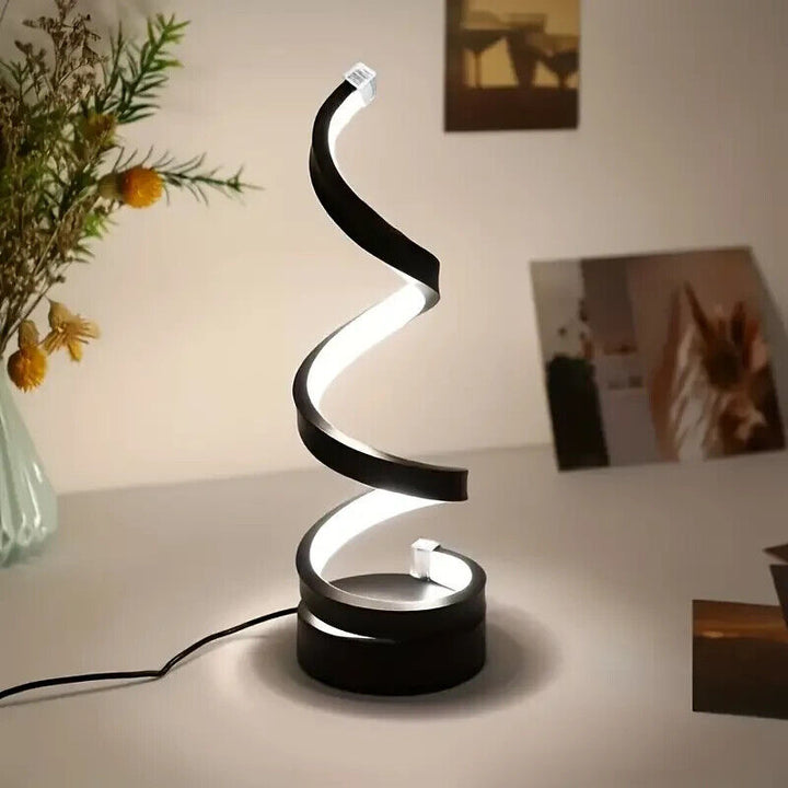 Stijlvolle dimbare LED designlamp Jayma, spiraalvormig, perfect voor moderne verlichting thuis.
