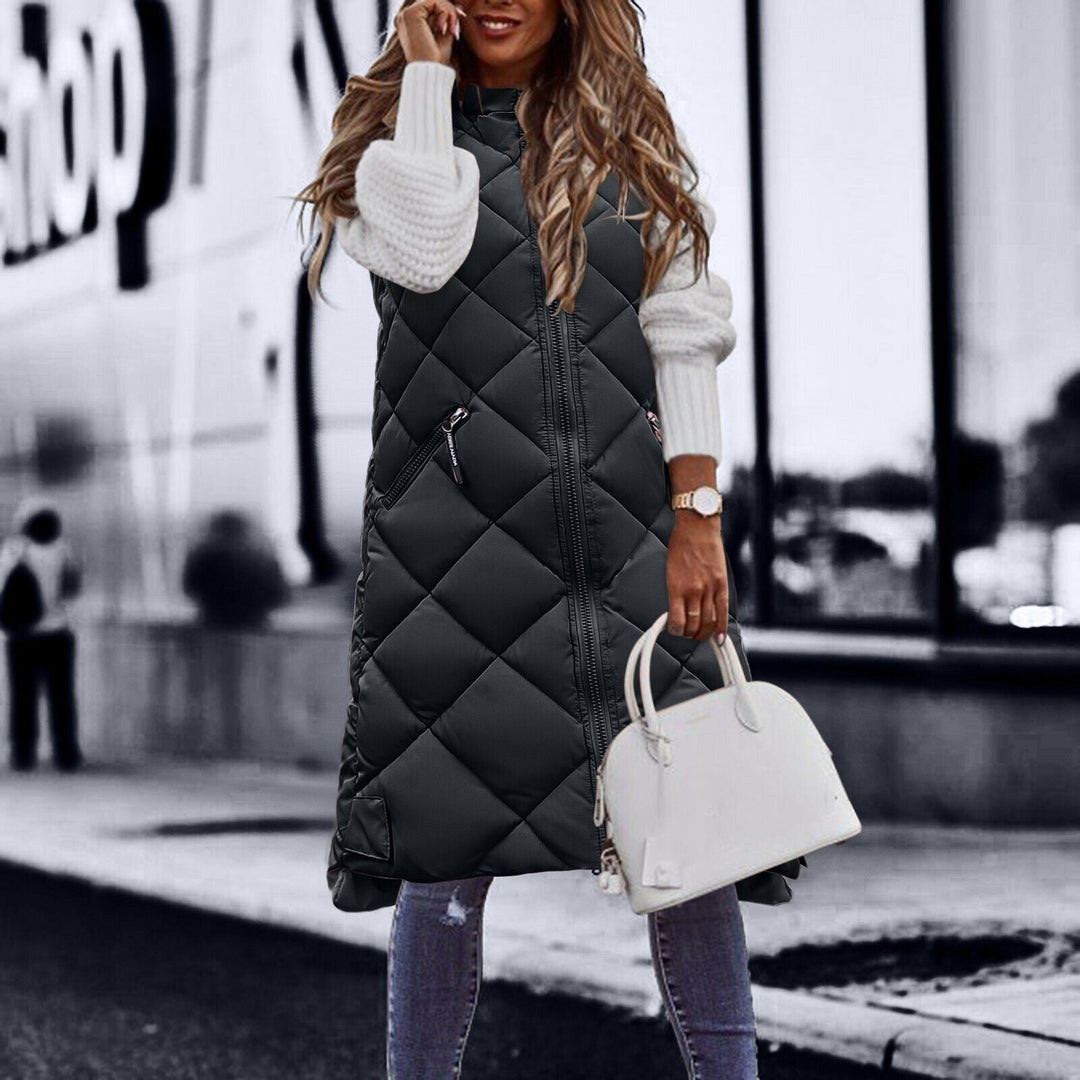 Dames bodywarmer lang model, met capuchon en verkrijgbaar in legergroen, zwart, bruin.