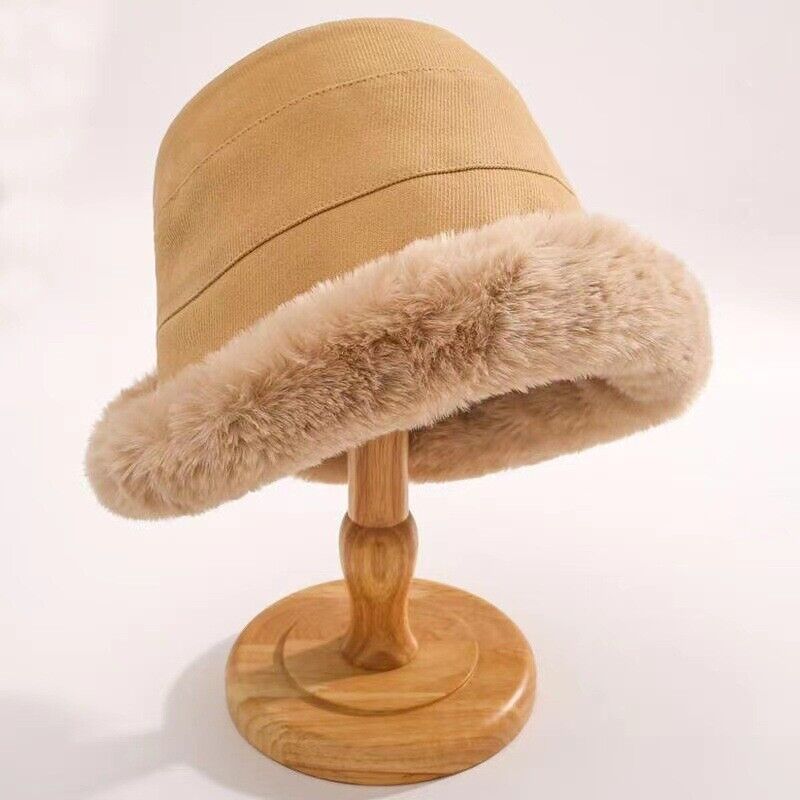 Chic pluche vissershoedje voor dames, stijlvolle wintermuts die warmte biedt.