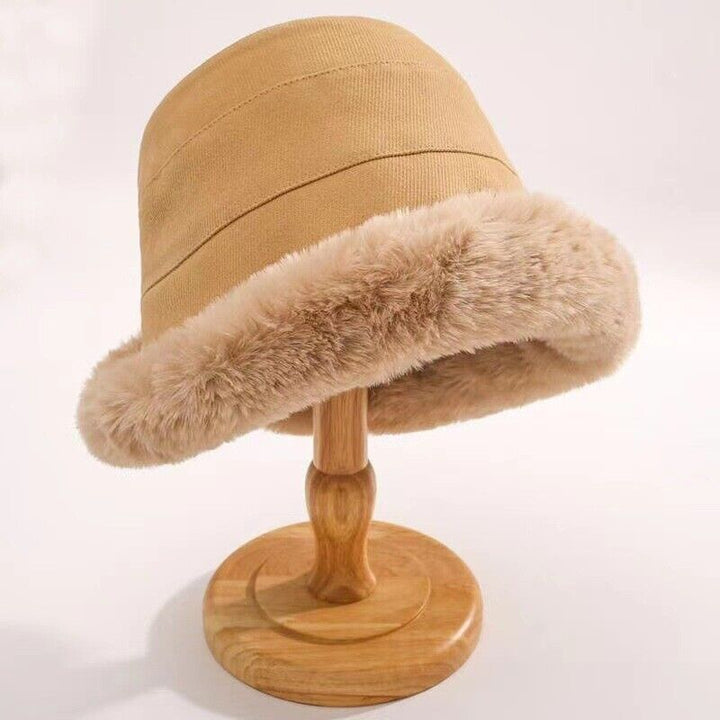 Chic pluche vissershoedje voor dames, stijlvolle wintermuts die warmte biedt.