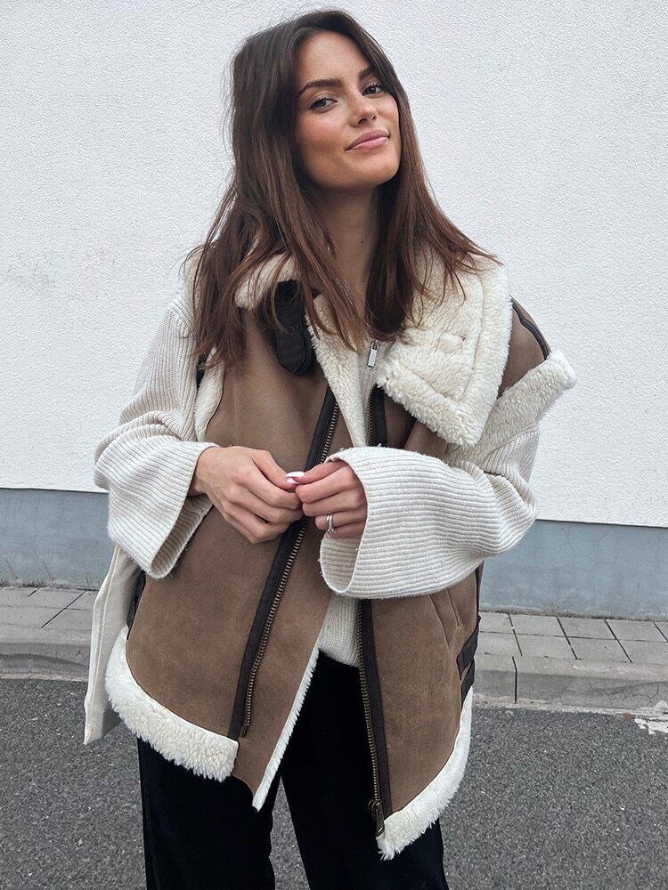 Casual dames vest van imitatieleer, warm en comfortabel; de ideale winter bodywarmer.