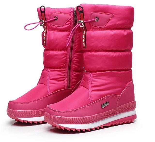 Detailfoto van warme, waterdichte dames snowboots met textuur; comfortabel en stijlvol voor de koude winter.
