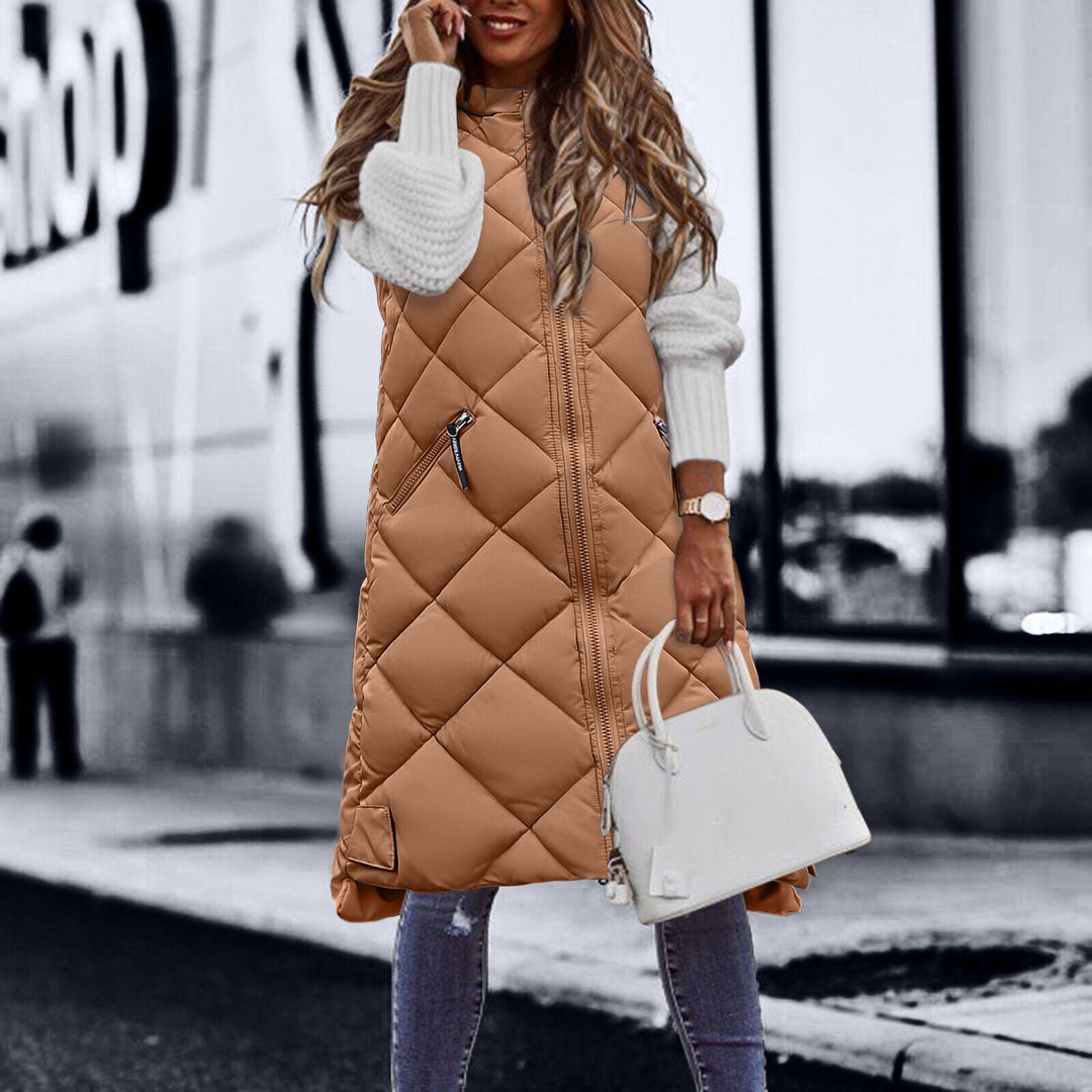 Warme lange bodywarmer voor dames met capuchon, perfect als modieuze bovenkleding in de winter.