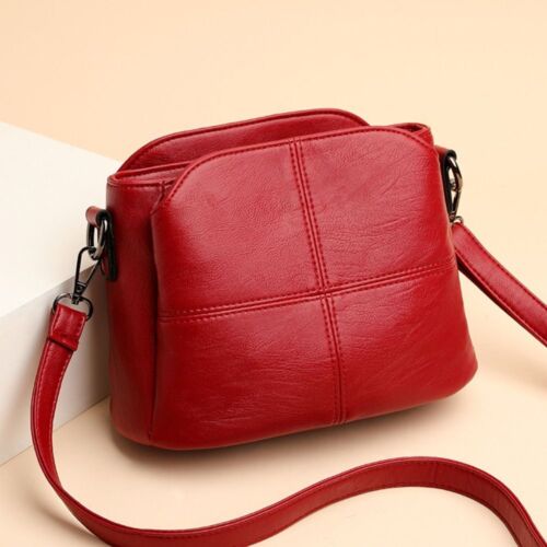 Elegante zwarte PU leren dames schoudertas met verstelbare riem; modieuze crossbody tas.