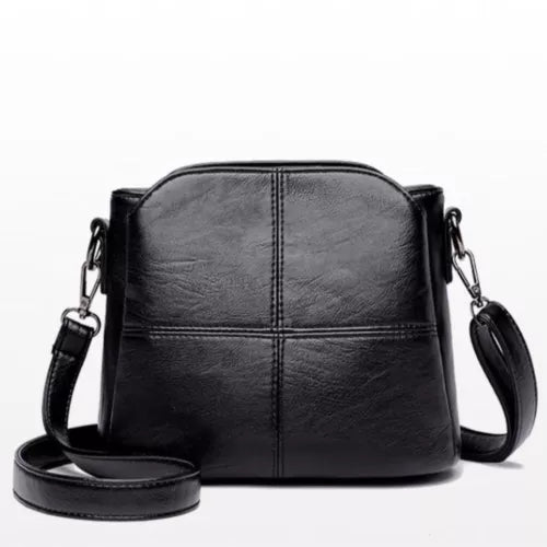 Praktische en elegante zwarte PU leren dames tas, te gebruiken als schoudertas, handtas of crossbody.