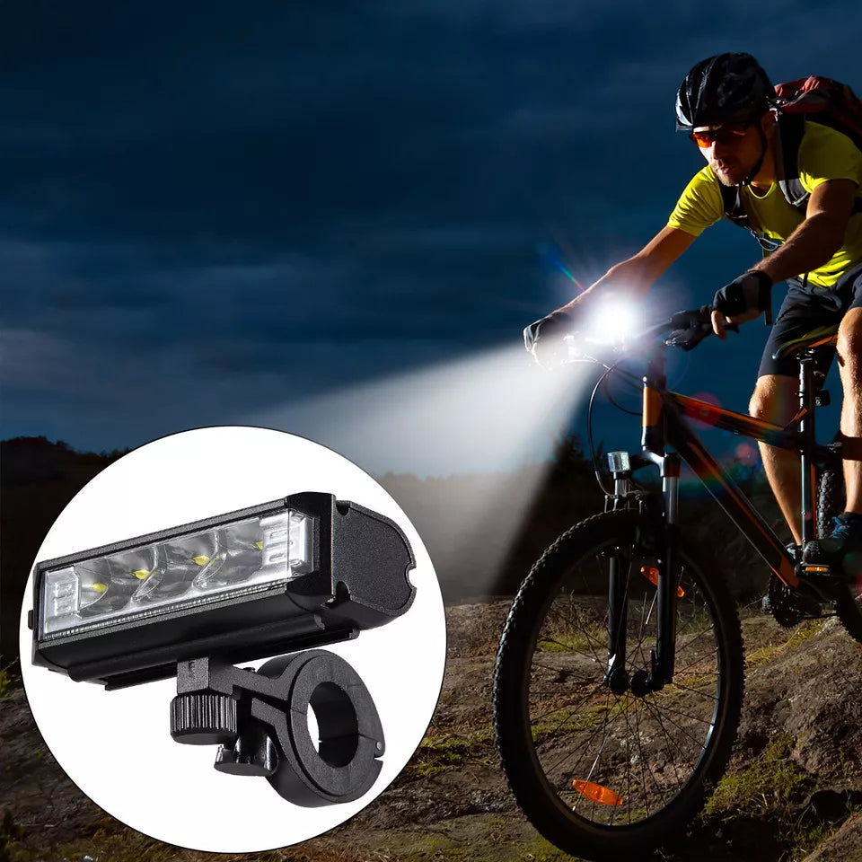 Oplaadbare LED fietslamp met verstelbare modi; essentieel fietsaccessoire voor mountainbike en stadsfiets.
