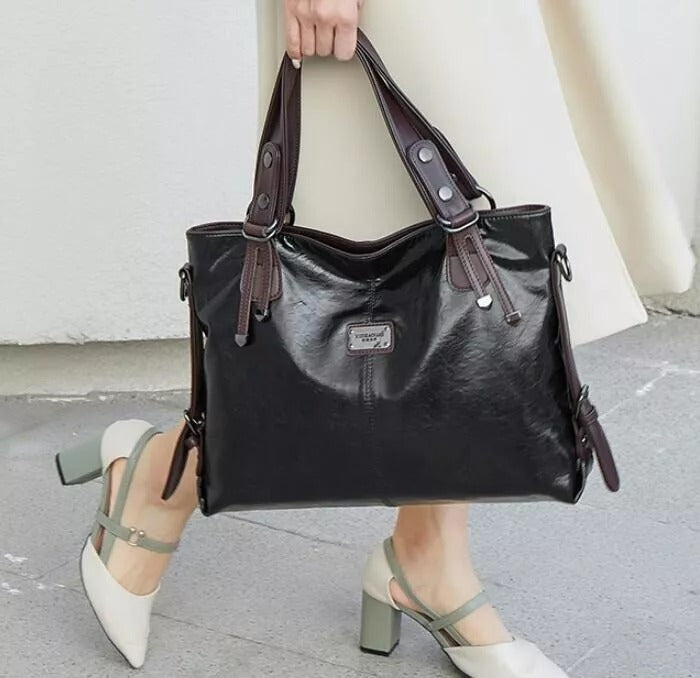 Zachte leren vintage schoudertas voor dames, ruime crossbody met verstelbare band.