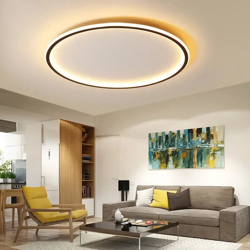 Witte Scandinavische LED plafondlamp, strak en rond design.