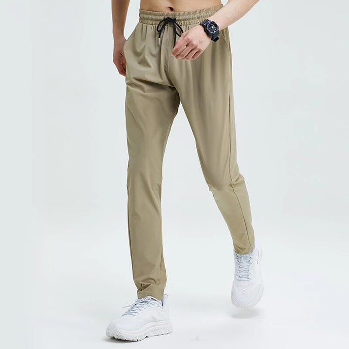 Stijlvolle heren joggers, ademend en sneldrogend. Veelzijdige sportkleding broek voor elke activiteit.