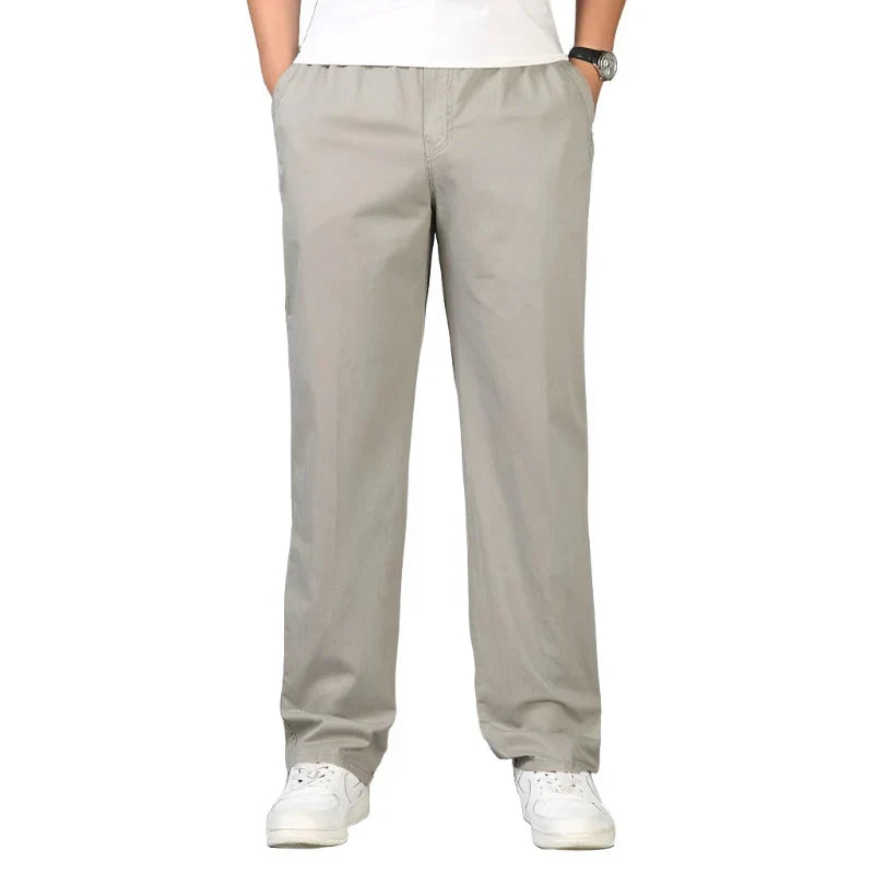 Heren wijde katoen linnen pantalon, op een witte achtergrond, toont de volledige broek.